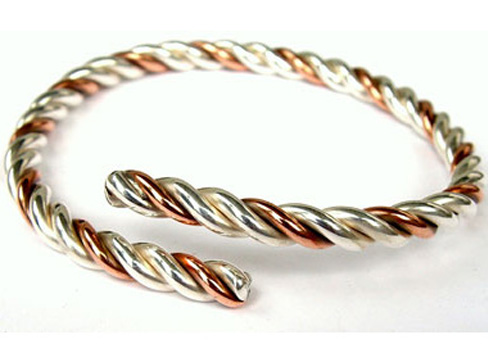 Three metal astrology bangle made from gold silver and copper